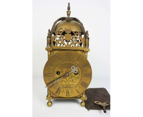 A brass lantern clock, circa 1880, in the 17th century style, of typical form, inscribed John Saunders, London, with an 18cm 