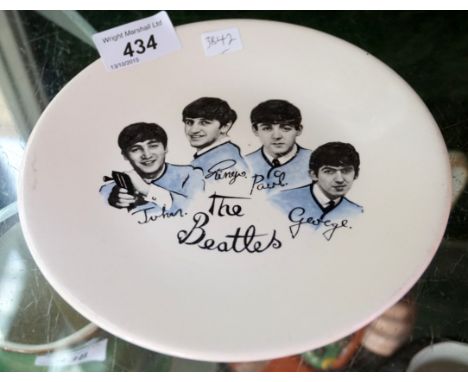 A 1960's Beatles transfer printed ceramic plate.