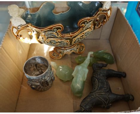 A mixed group of items to include four Jade style items, a cast metal model of a donkey, a Continental Majolica twin handled 