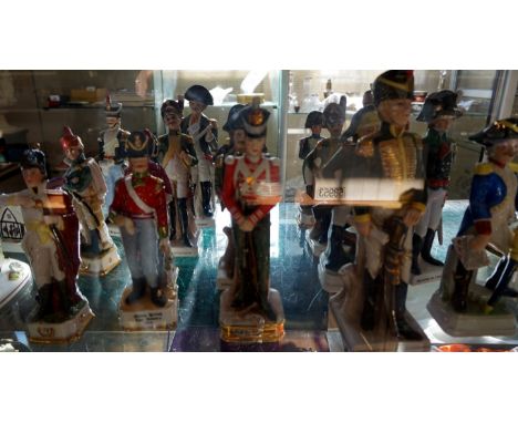 A group of nineteen ceramic soldier figures to include examples by Capodimonte etc.  