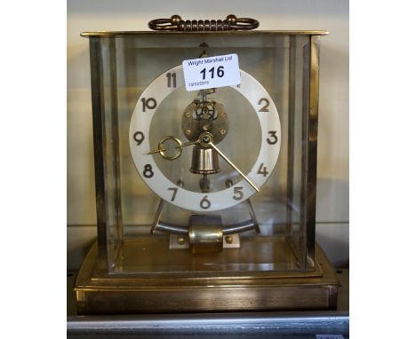 A vintage Kundc electronic mantel clock.
