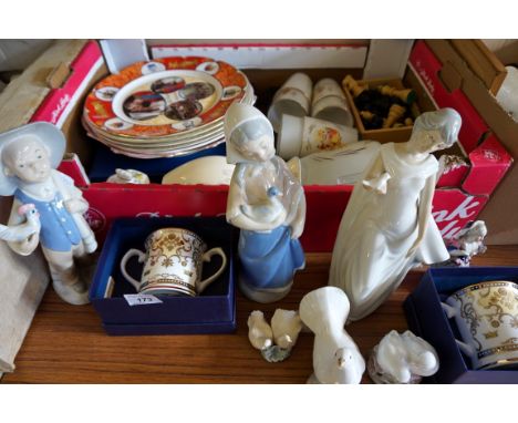 A mixed lot of assorted items to include collectors plates, modern chess set, Lladro style figurines, loving cups etc.