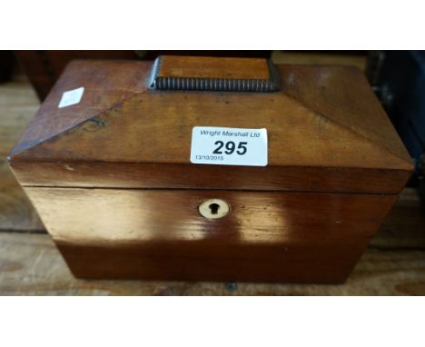 A Victorian mahogany tea caddy.