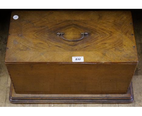 An early 20th Century walnut cased manual sewing machine.
