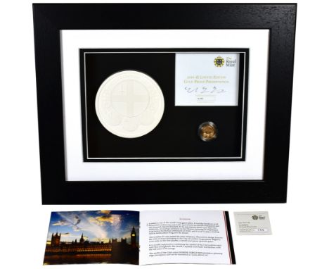g Elizabeth II (1952-), gold Proof One Pound Coin, 2010, in presentation picture frame with plaster cast of the London revers