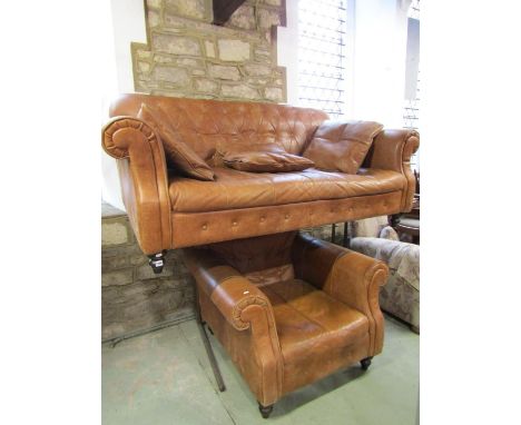 A good quality contemporary but traditional style tan leather sofa with buttoned back and rolled arms, 84cm high x 195cm x 10