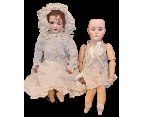 Two early 20th century German bisque head dolls comprising an Armand Marseille mould 370 shoulder-head doll with jointed kid 