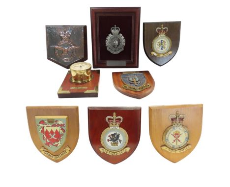 A small collection of  RAF, SAS, squadron and regiment plaques and a clock.