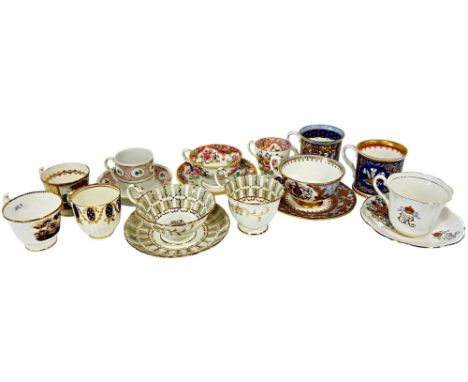 A collection of 19th century porcelain cups and saucers, including Coalport, Caughley, Spode, etc, together with four royal c