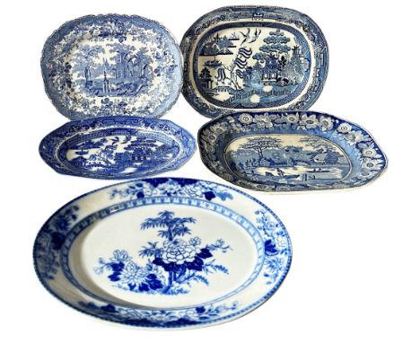 A large collection of 19th century and later blue and white ceramics including ewer and basin, various meat plates, milk jugs