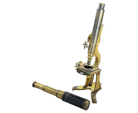 A 19th century brass microscope and a Crichton six drawer brass telescope. 