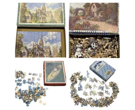 Six vintage plywood jig-saw puzzles including a GWR puzzle, four Victory puzzles, and a Delta puzzle.