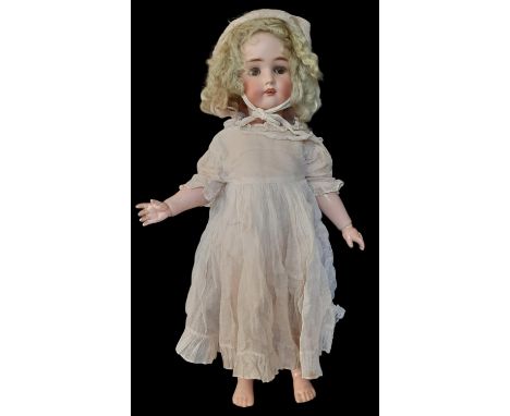 Early 20th century bisque head doll by Kammer &amp; Rheinhardt with head by Simon &amp; Halbig, with fixed brown eyes, pierce