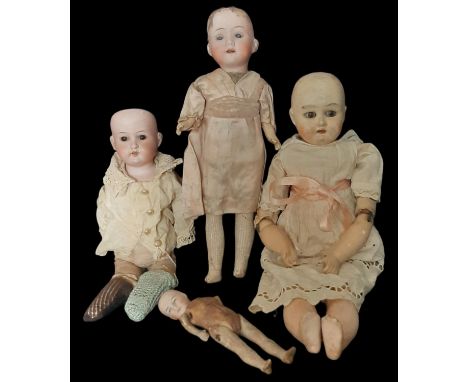 4 small bisque head dolls for restoration comprising a miniature doll marked M with wooden limbs, height 14cm, a shoulder hea