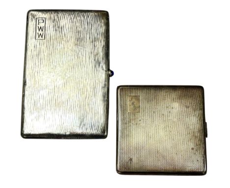 An Edwardian VII silver cigarette case, Chester 1908, Asprey &amp; Co Ltd, the covers with textured finish and blue cabochon 