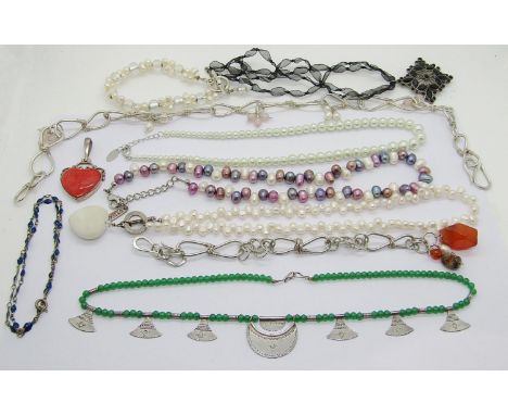 Modern silver and costume jewellery to include a silver amethyst set bangle, a silver heart shaped red coral pendant, gold pl