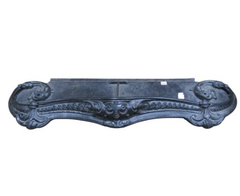 A 19th century cast iron fender with serpentine front, scrolling acanthus and pierced detail, 121 cm wide