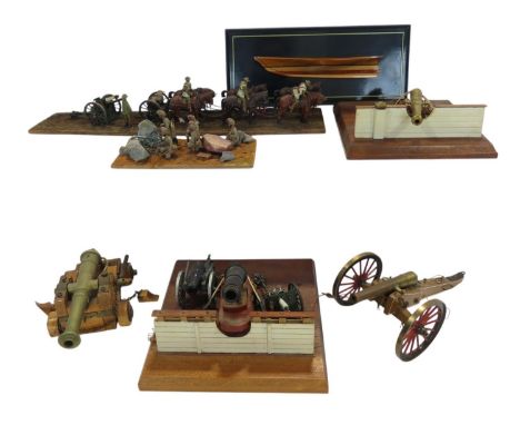 Six model military canons, a WWI model six horse Artillery Team with riders, an Indian Sikh gun emplacement, together with a 