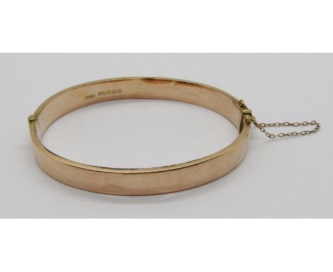 9ct hinged bangle, maker Smith &amp; Pepper Ltd, Birmingham 1938, 8.2g (dented)