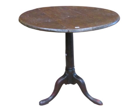 A 19th century oak snap top table of circular form raised on a simple turned pillar and shaped tripod 68 cm h x 72 cm d 