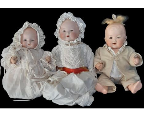 Three 1920's bisque head baby dolls by Armand Marseille including a Dream Baby mould 341 with blue closing eyes and 5 piece b