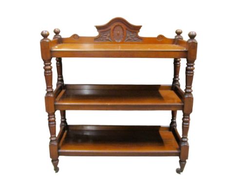A Victorian mahogany three tier buffet on turned supports, 110cm high x 105cm x 40cm
