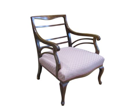 An inlaid Edwardian mahogany open armchair with upholstered seat and cabriole forelegs 