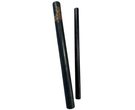 A 19th century ebony cylinder truncheon with a painted coat of arms, 51cm long, together with an ebony baton 46cm long. (2)