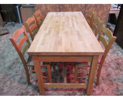 A contemporary beech dining/kitchen table with rectangular blockwork top, over three frieze drawers on square cut supports, t