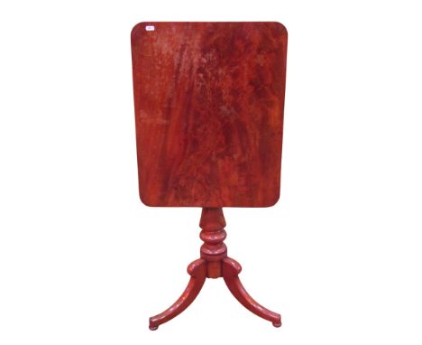 A 19th century mahogany snap top table the rectangular top raised on a turned pillar and swept tripod 73 cm high x 61 cm x 48