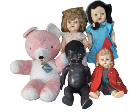 Four vintage dolls with voice box comprising a walking doll by Pedigree in blue dress, an unbranded walking doll in cotton pr