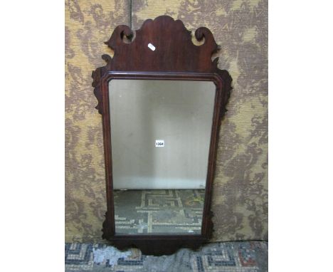A Georgian mahogany wall mirror in the Chippendale style with fret carved surround (af) 97cm x 50cm approx 