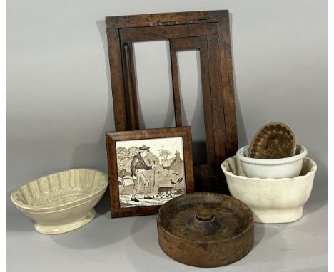 A Victorian brass and iron trivet together with a desktop folding lectern, four vintage jelly moulds, a heavy ashtray and a f