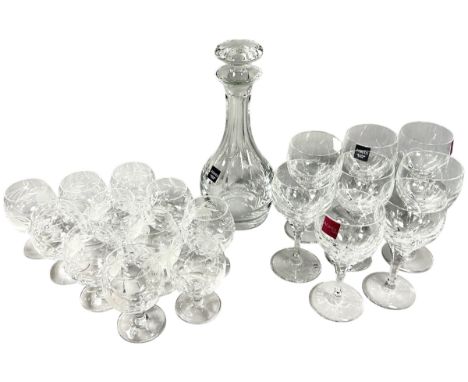 Eight Atlantis faceted wine glasses and matching decanter, ten floral engraved brandy glasses, four assorted decanters, a Mur