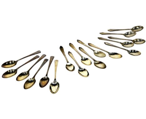 Two cased sets of silver teaspoons, a third case with five teaspoons together with six loose teaspoons and a knife and fork a