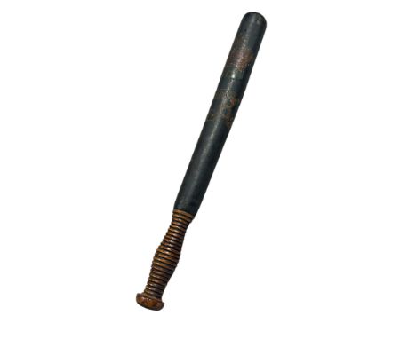 A Victorian truncheon with a painted crown and initials VR 