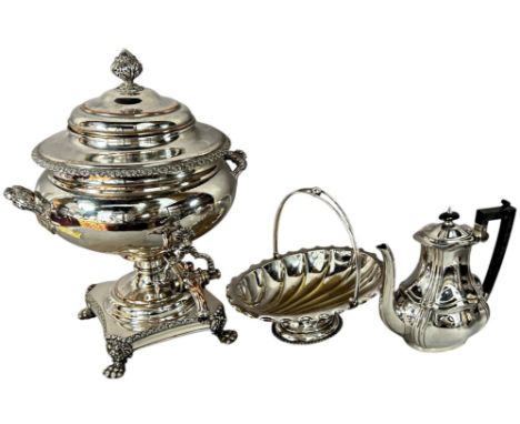 A large silver plated samovar complete with coal heating column to the interior raised on a square platform on paw feet, toge