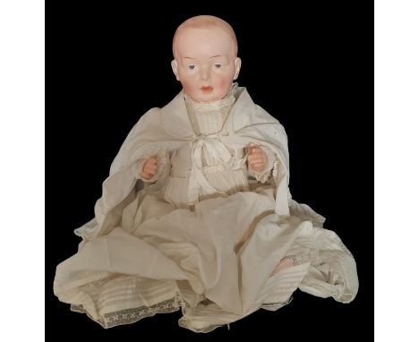 Early 20th century bisque head character doll by Eisenmann in the style of a Kaiser baby with   composition body, marked Einc