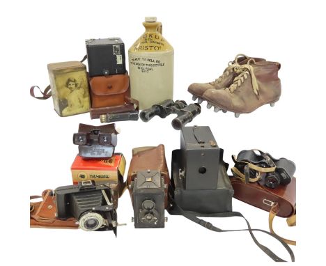 A pair of vintage rugby boots, old binoculars, a selection of vintage cameras Drem lightmeter, viewer, flagon, a Royal Family