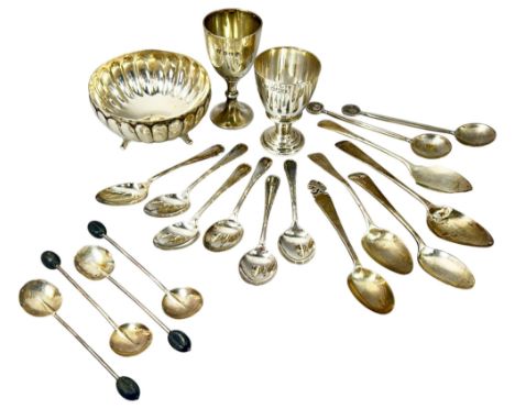 A cased set of six silver teaspoons, together with loose coffee and teaspoons, two silver egg cups and a silver plated bowl, 