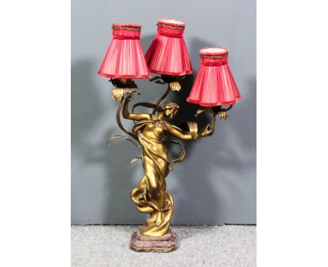 An early 20th Century French gilt spelter three branch electric table lamp modelled as a girl dancing, on marble base, 23.5in