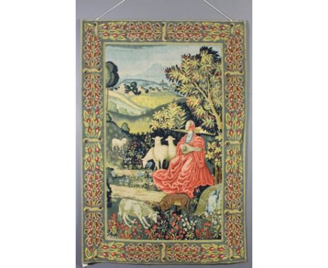 A 20th Century French tapestry by Robert Four of Paris, worked in colours with a seated shepherdess playing a mandolin surrou