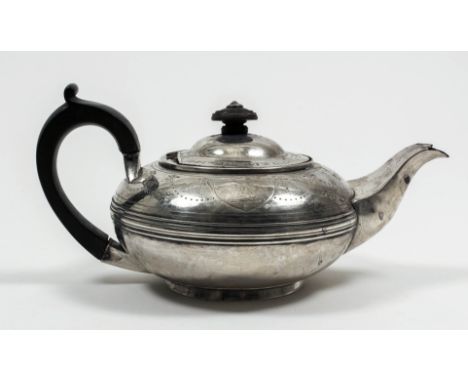 A George IV bachelor's silver squat teapot, the body with moulded girdle and engraved with two cartouches and swag ornament, 