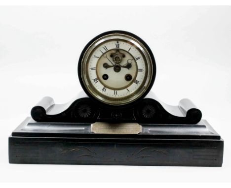 A late 19th Century French black slate cased mantel clock, the 3.25ins white enamelled chapter ring with Roman numerals and v