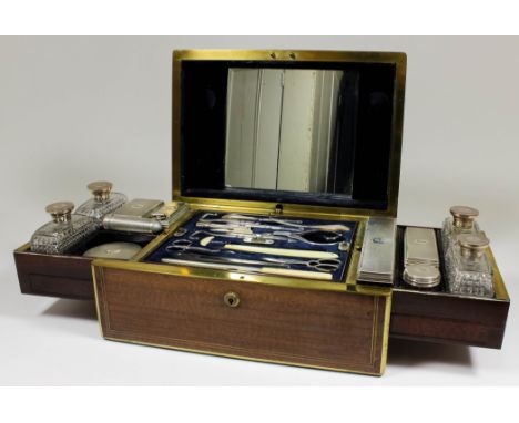 A Victorian lady's brass bound rosewood toilet box with blue leather and velvet lined interior, fitted two sliding trays comp