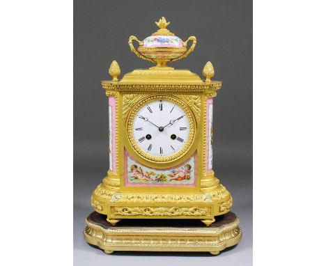 A mid 19th Century French ormolu and porcelain mounted mantel clock by J.B.D., No. 2936 16, the 3.75ins diameter white enamel