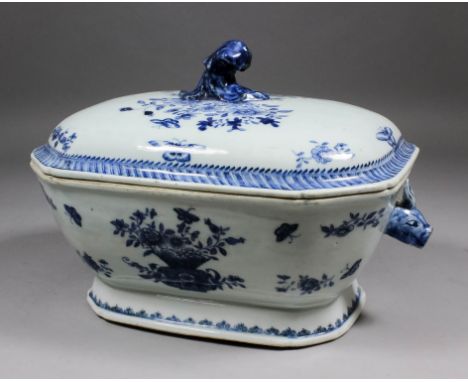 A Chinese blue and white porcelain tureen and cover, the cover with knop finial and painted with a vase of flowers and scatte