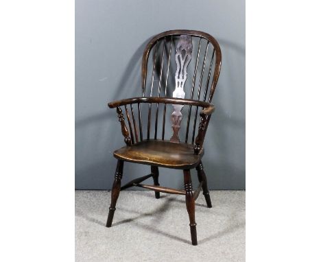 A 19th Century elm and yew wood two tier stick back Windsor armchair with arched crest rail, pierced vase pattern splat, wood