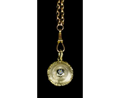 A late Victorian 9ct gold longard with plain oval links, 1480mm overall (weight 28 grammes), with small circular engine turne