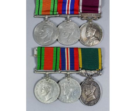 Two groups of three George VI Second World War medals comprising, !939 - 45 War Medal, 1939 - 45 Defence Medal and Territoria